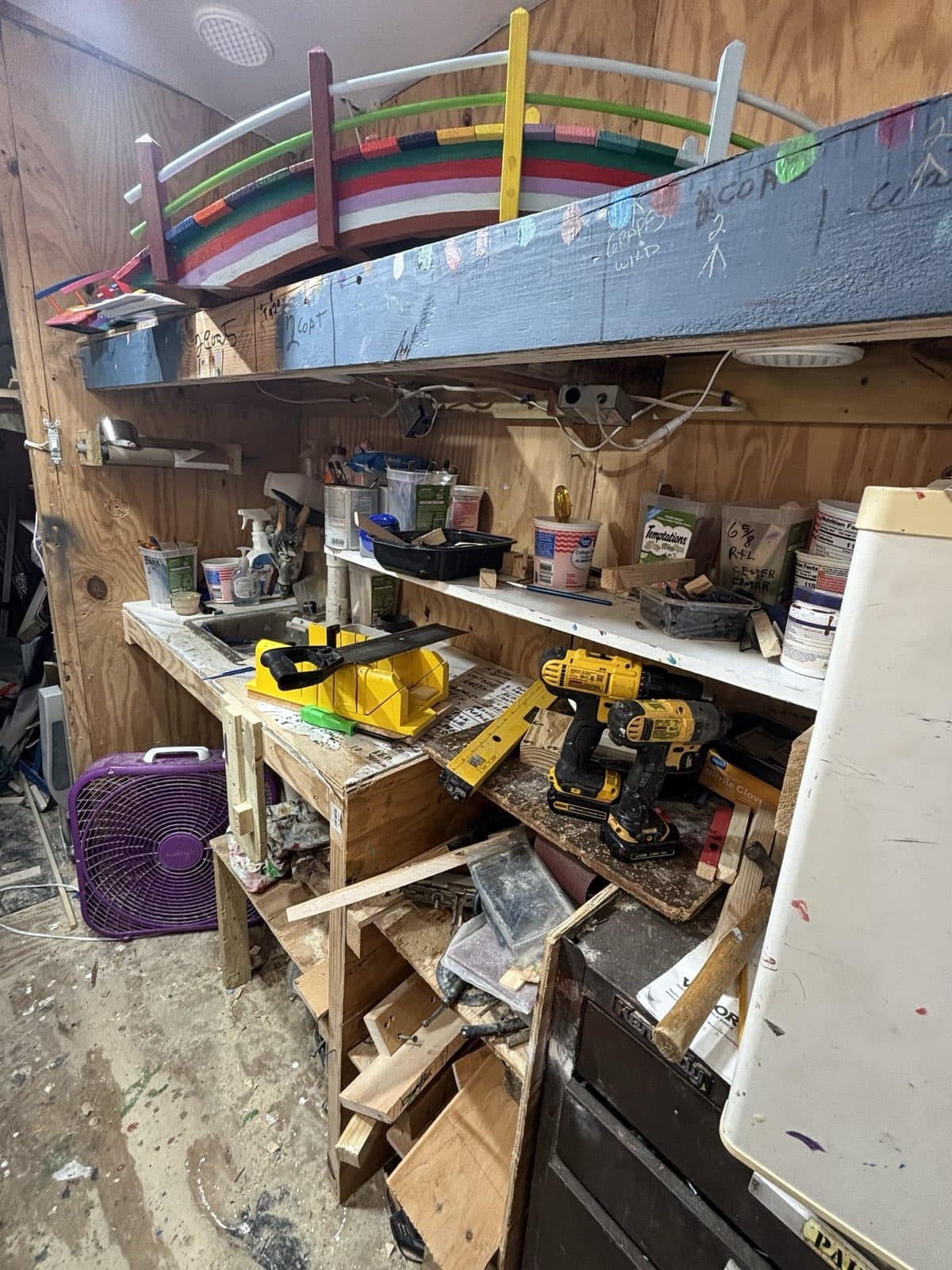 A second angle of Paul Allabaugh's workbench showing his tools and materials